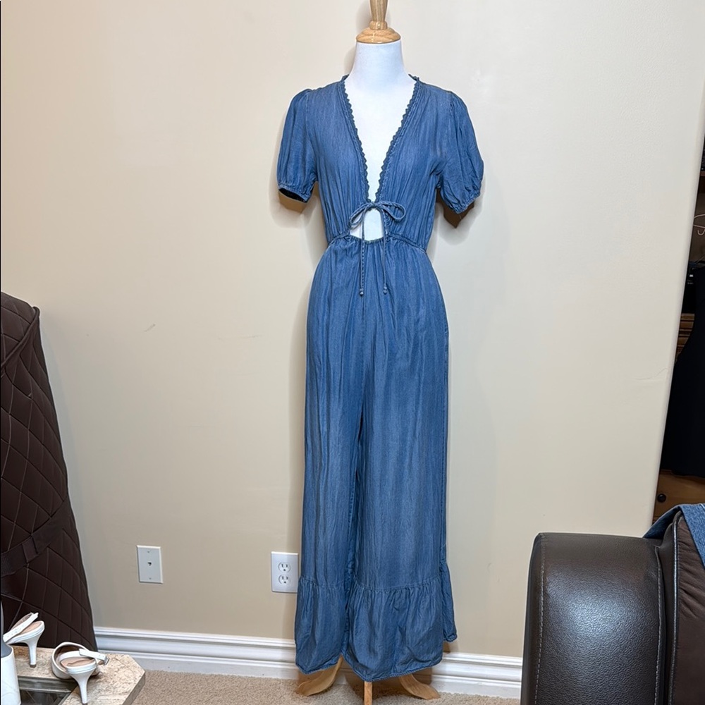 Chic Blue Jumpsuit with Puff Sleeves and Flared Tiered Pants